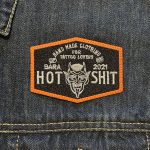 HOTSHIT BY BARA PARCHE NARANJA